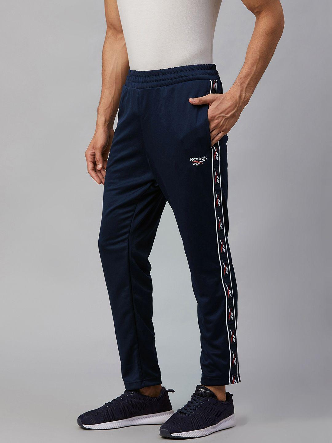 reebok classic men navy blue vector tape track pants