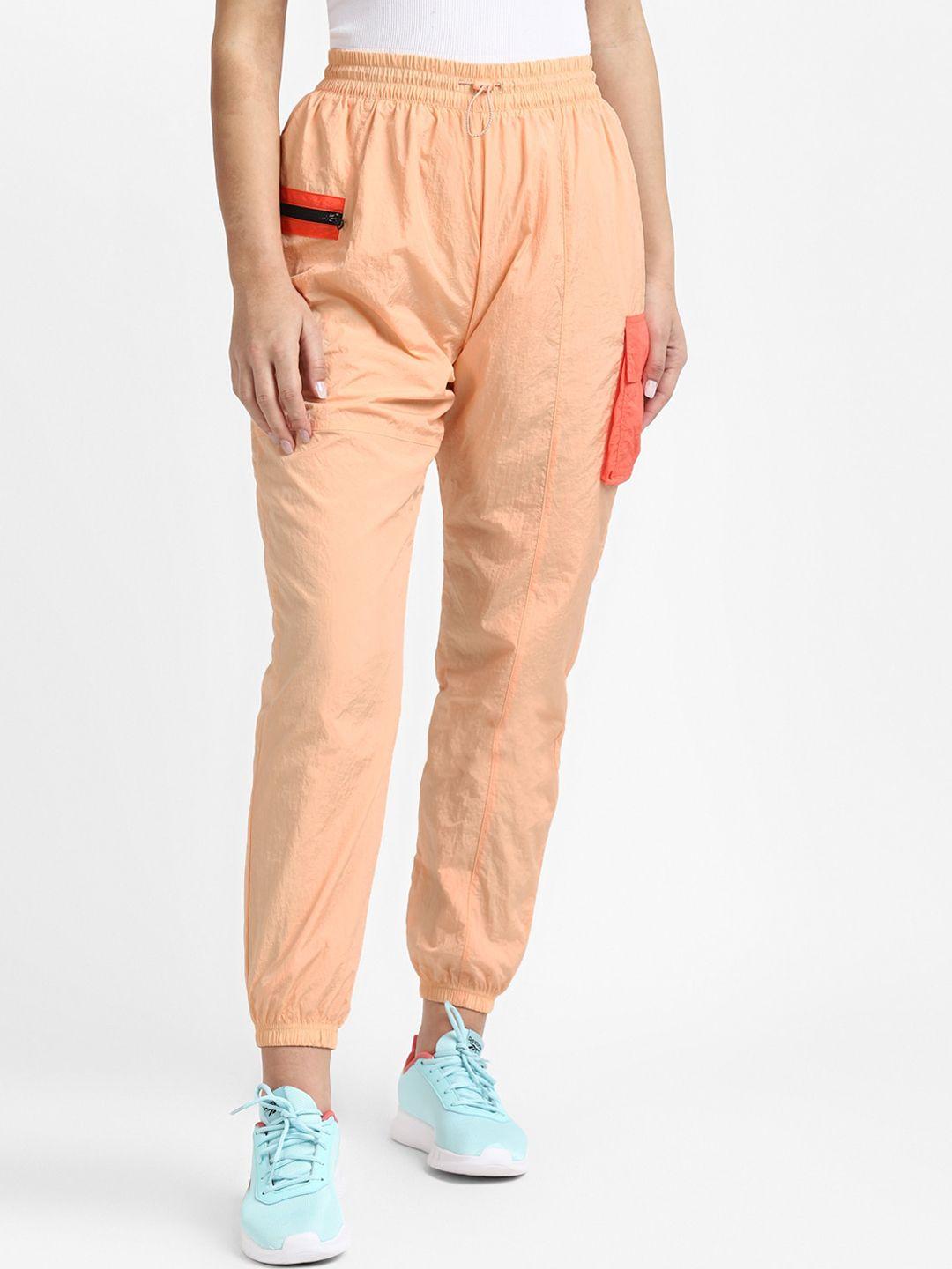 reebok classic women peach-coloured & orange solid oversized-fit joggers