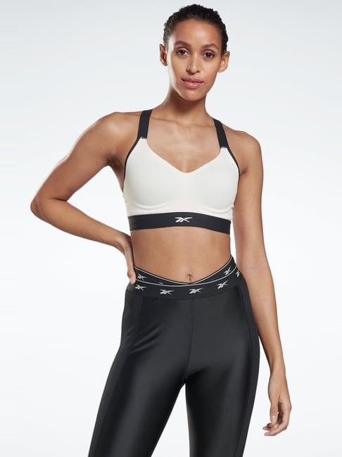 reebok cream padded sports bra