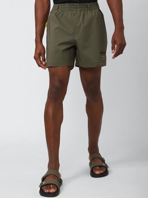 reebok green cotton slim fit self pattern shorts