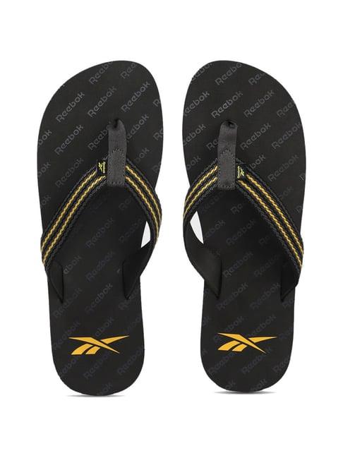 reebok men's heracle black flip flops