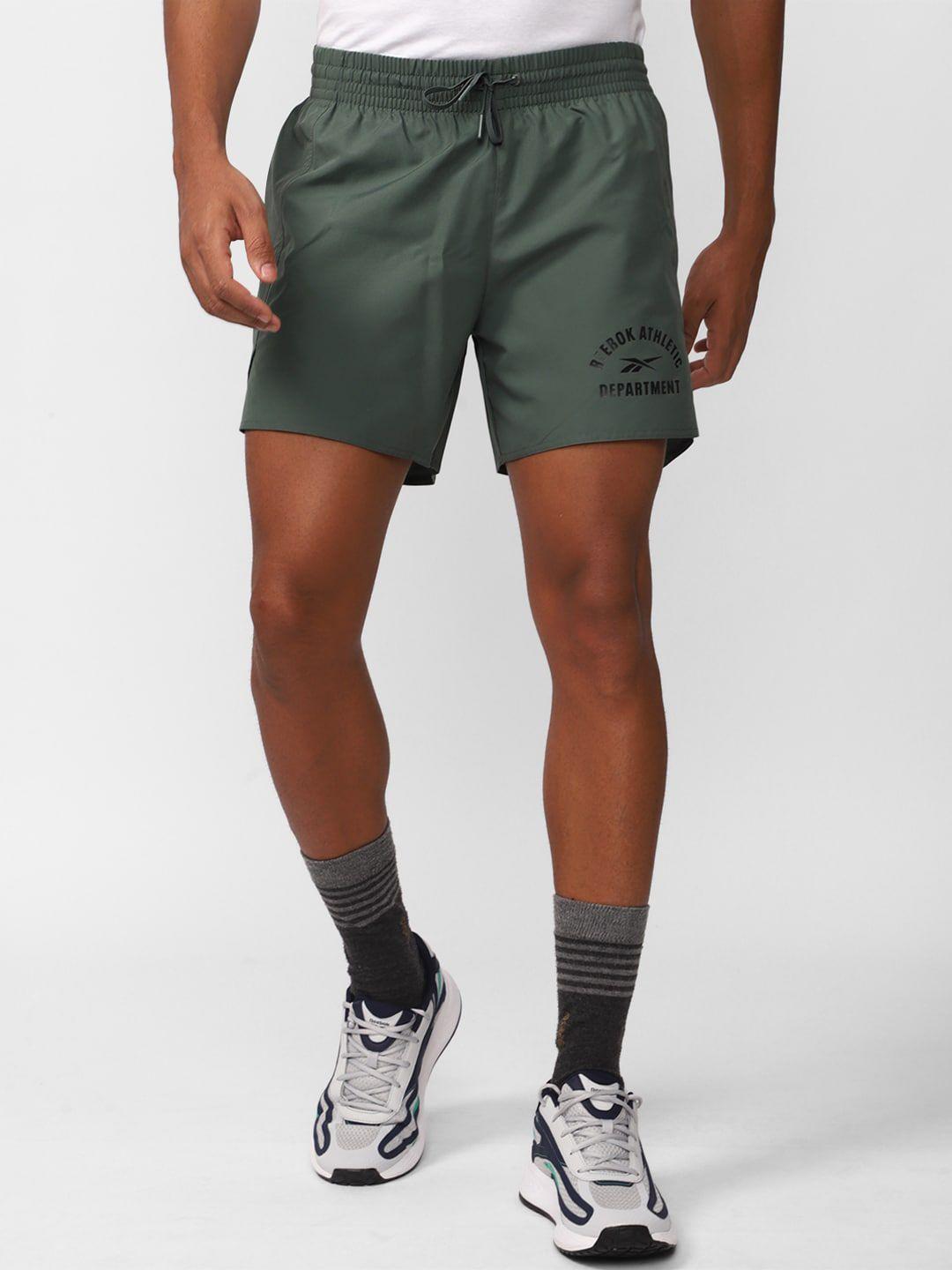 reebok men train woven graphic chlgrn printed sports shorts