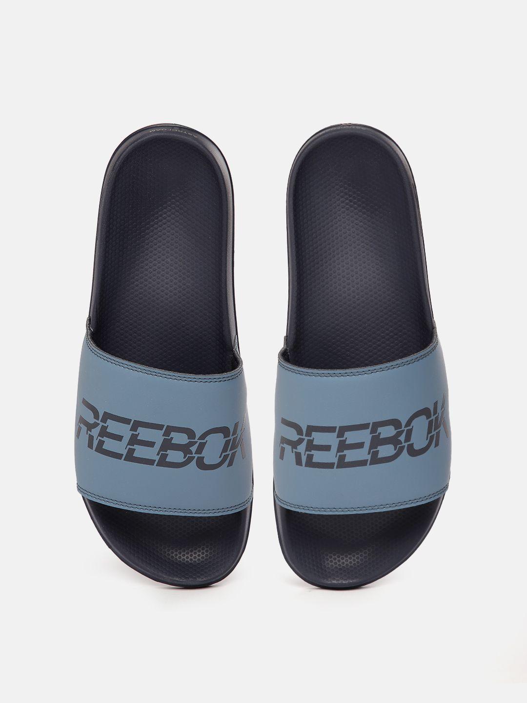 reebok unisex printed vector sliders