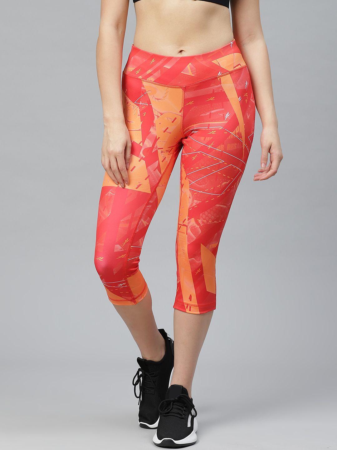reebok women coral orange & coral red printed workout ready capri 3/4th length tights