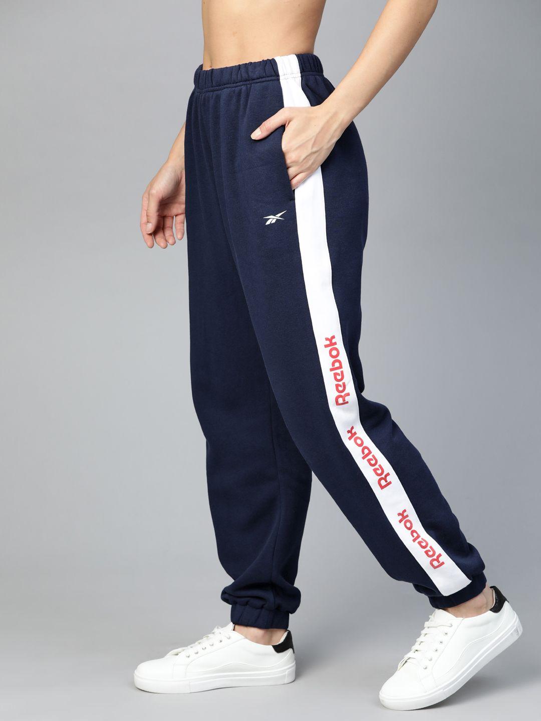 reebok women navy blue solid training essentials linear logo joggers