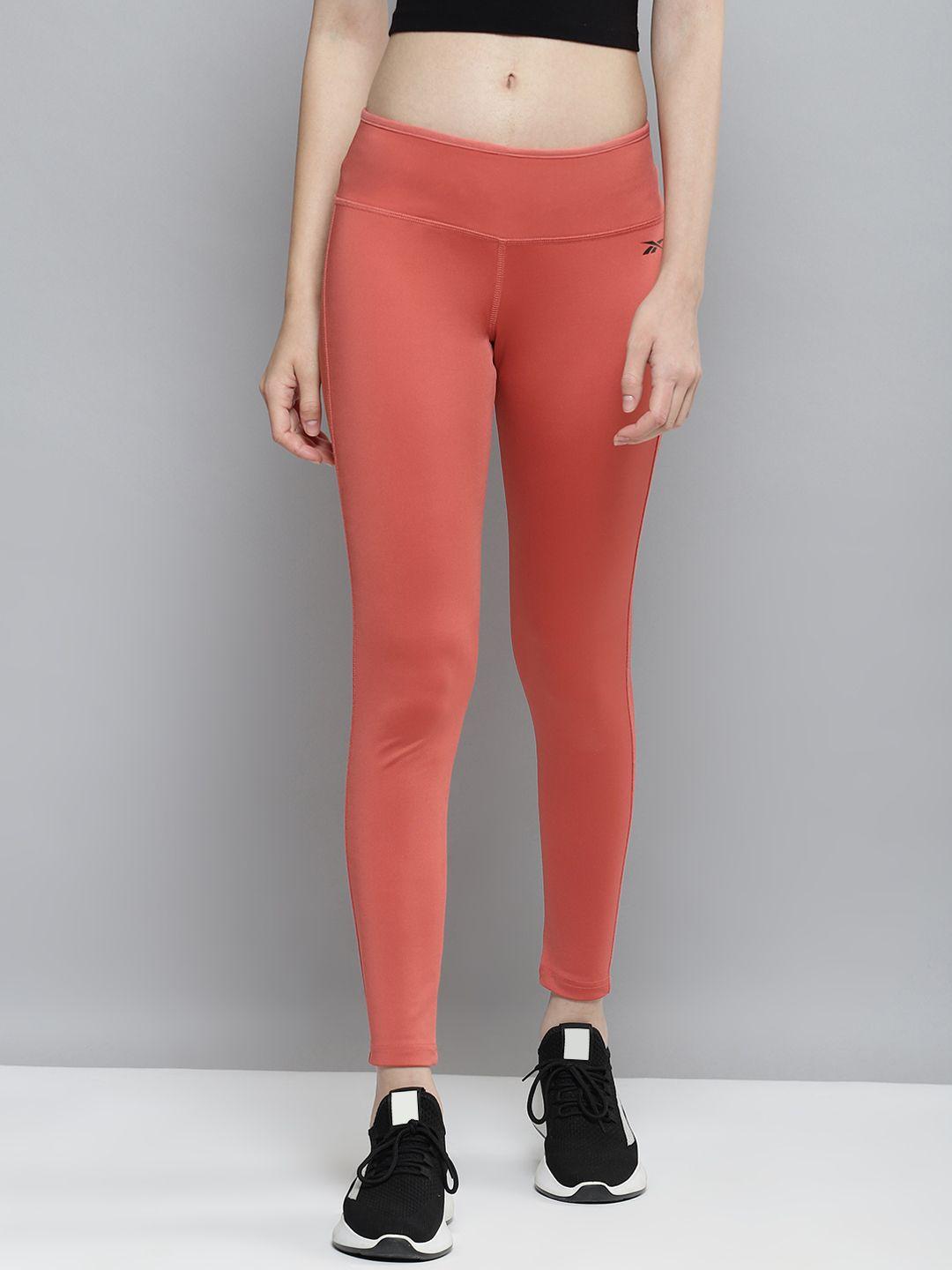 reebok women peach-coloured fnd solid training tights