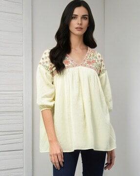 relaxed fit embroidered v-neck top