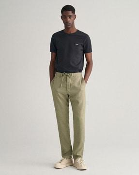 relaxed fit flat-front trousers