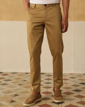 relaxed fit flat-front trousers