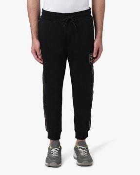 relaxed fit joggers with velvet patch