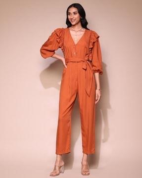 relaxed fit ruffle jumpsuit with waist tie-up