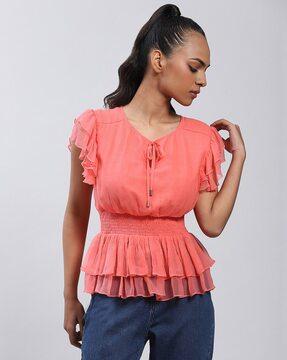 relaxed fit smocked peplum top with flutter sleeves