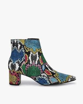 reptilian ankle-length boots with zip closure