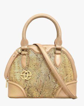 reptilian handbag with detachable strap