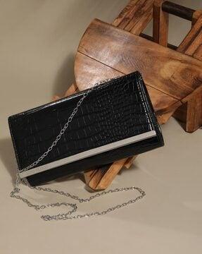 reptilian pattern clutch with detachable strap