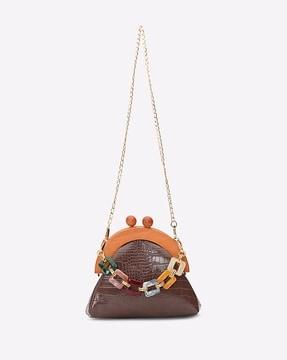reptilian pattern sling bag with detachable strap