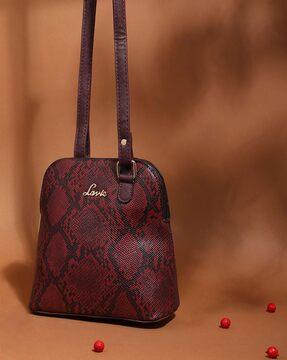 reptilian pattern sling bag with detachable strap