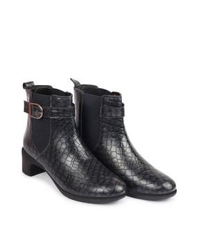 reptilian pattern slip-on boots