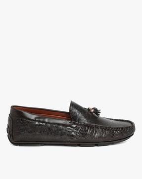 reptilian pattern slip-on shoes with tassels