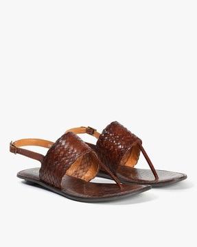 reptilian pattern t-strap flat sandals
