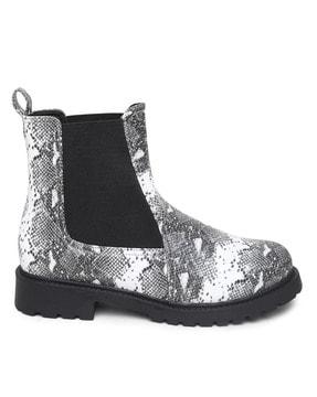 reptilian print boots with elasticated gussets