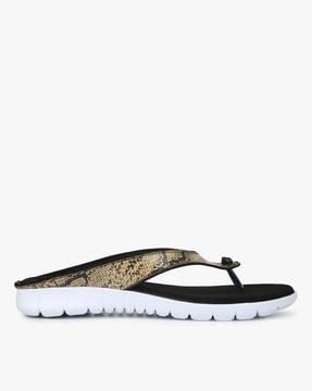 reptilian print t-strap flat sandals