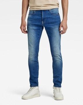 revend mid wash skinny jeans