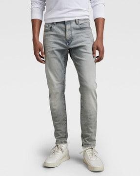 revend skinny fit mid-wash jeans