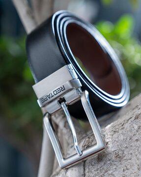 reversible belt with tang-buckle closure
