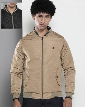 reversible puffer jacket with slip pockets
