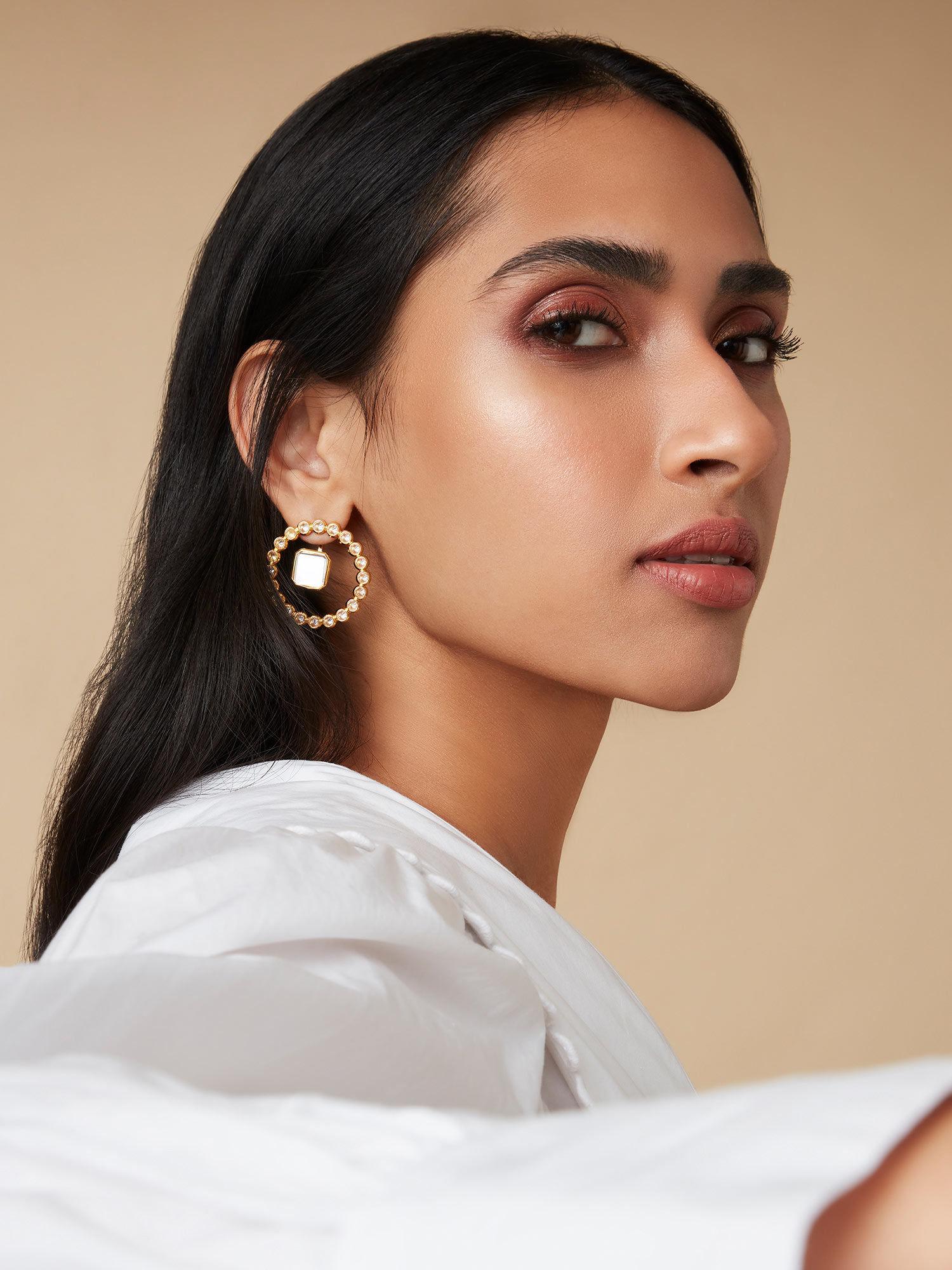 revolution earrings in 18k gold plated