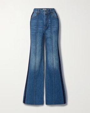 rhythmic super flare jeans with contrast taping