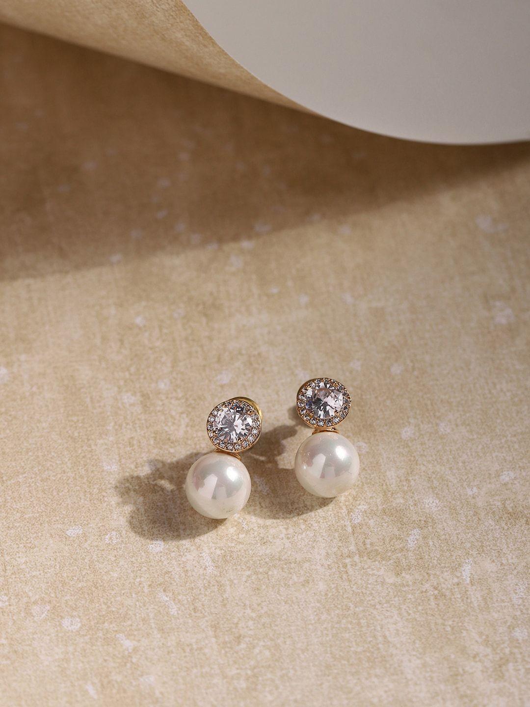 ritu singh white contemporary studs earrings