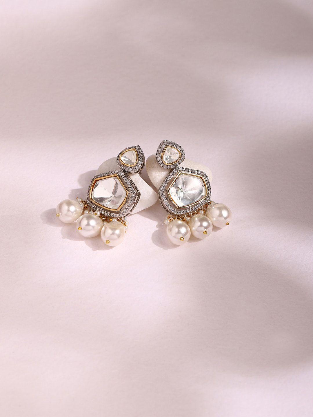ritu singh silver-toned contemporary jhumkas earrings