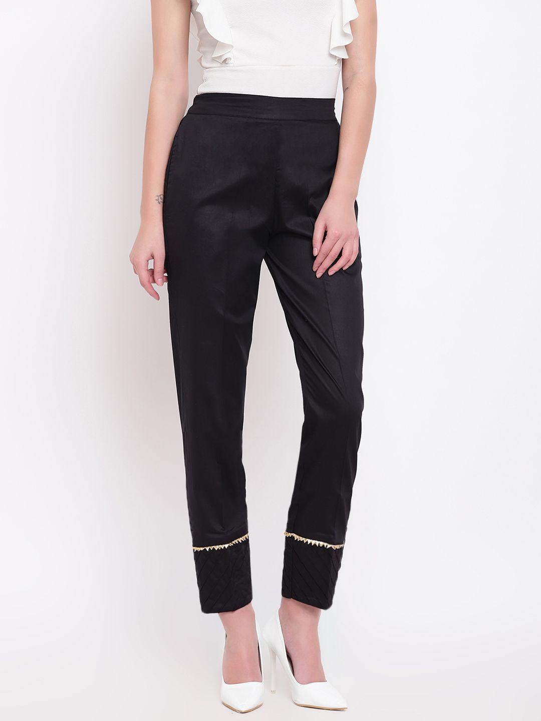 rivi women black regular fit solid regular trousers