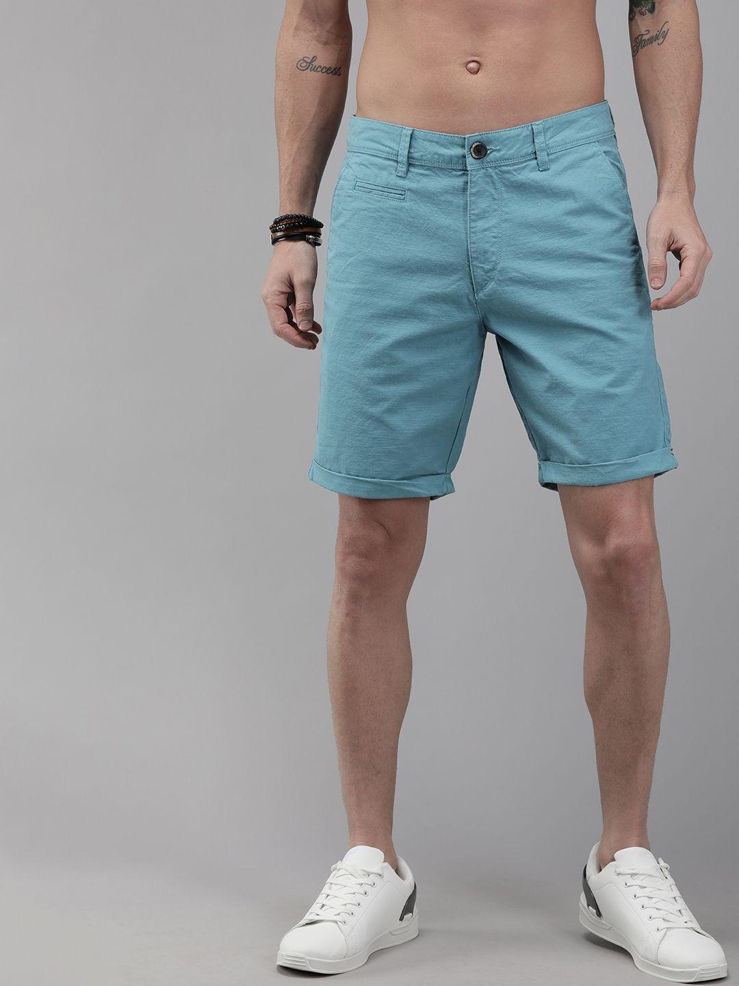 roadster men blue solid regular fit regular shorts