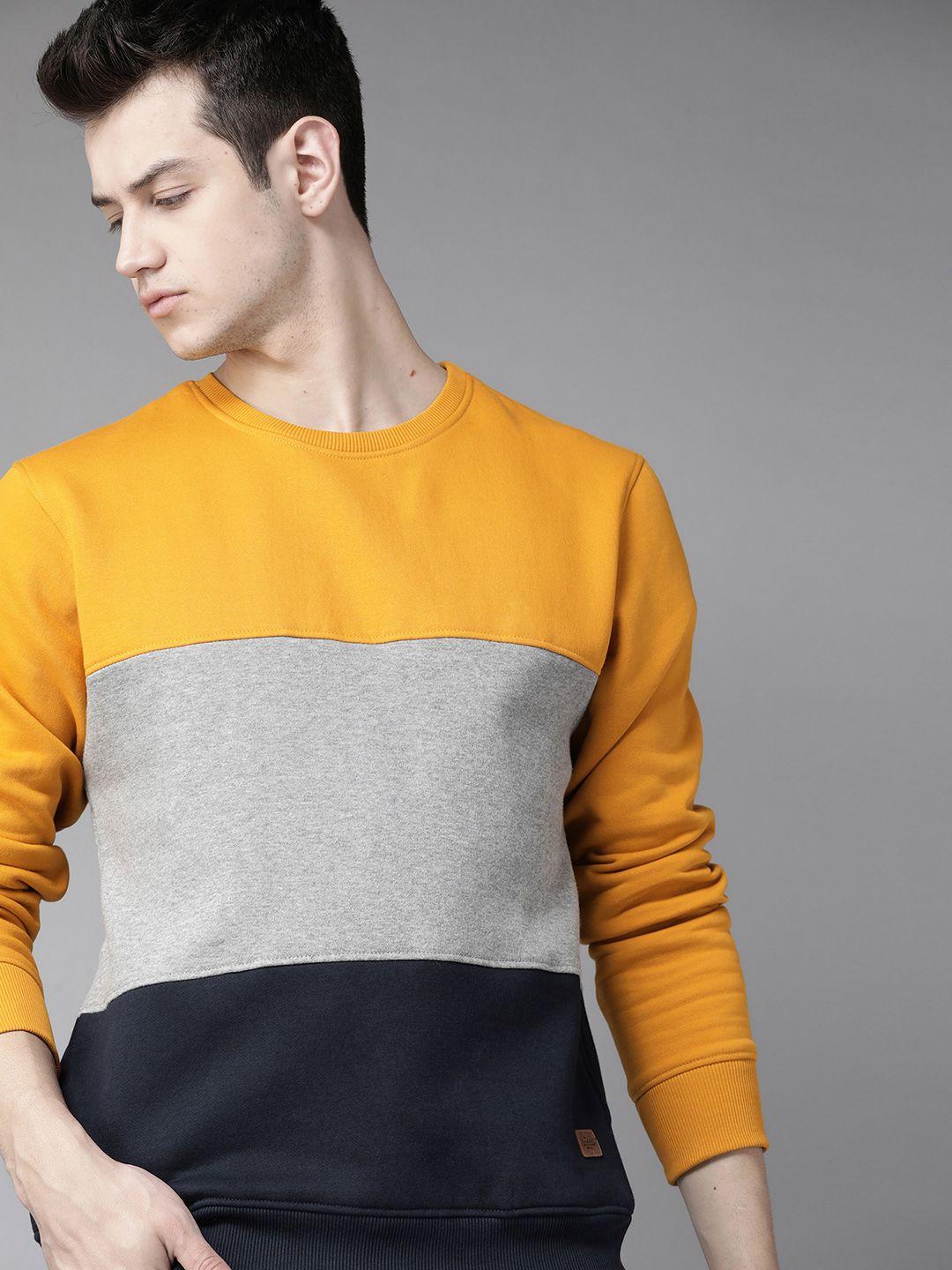 roadster men mustard yellow & grey melange colourblocked sweatshirt