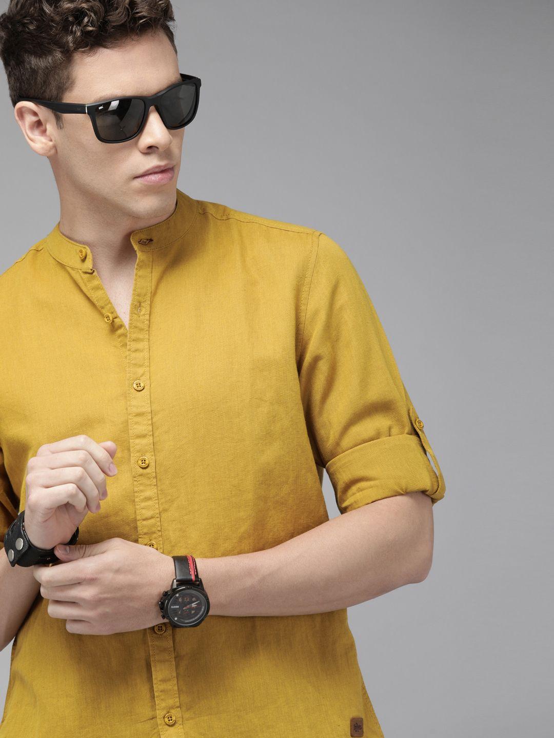 roadster men mustard yellow regular fit solid casual sustainable shirt