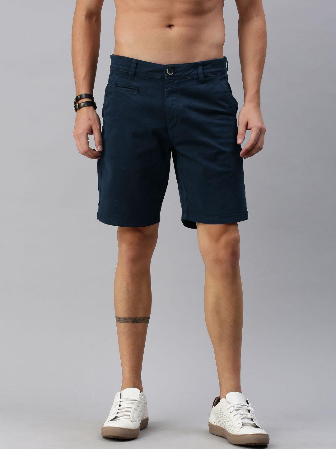 roadster men navy blue solid regular fit regular shorts