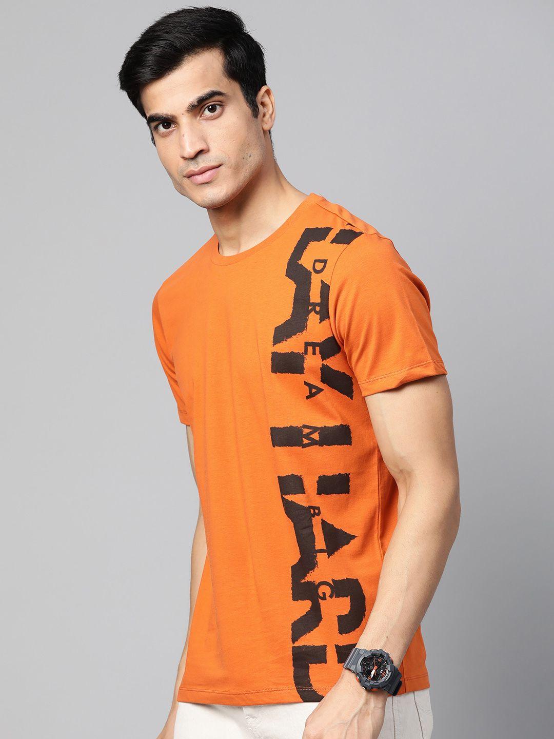 roadster men rust orange & black printed round neck t-shirt