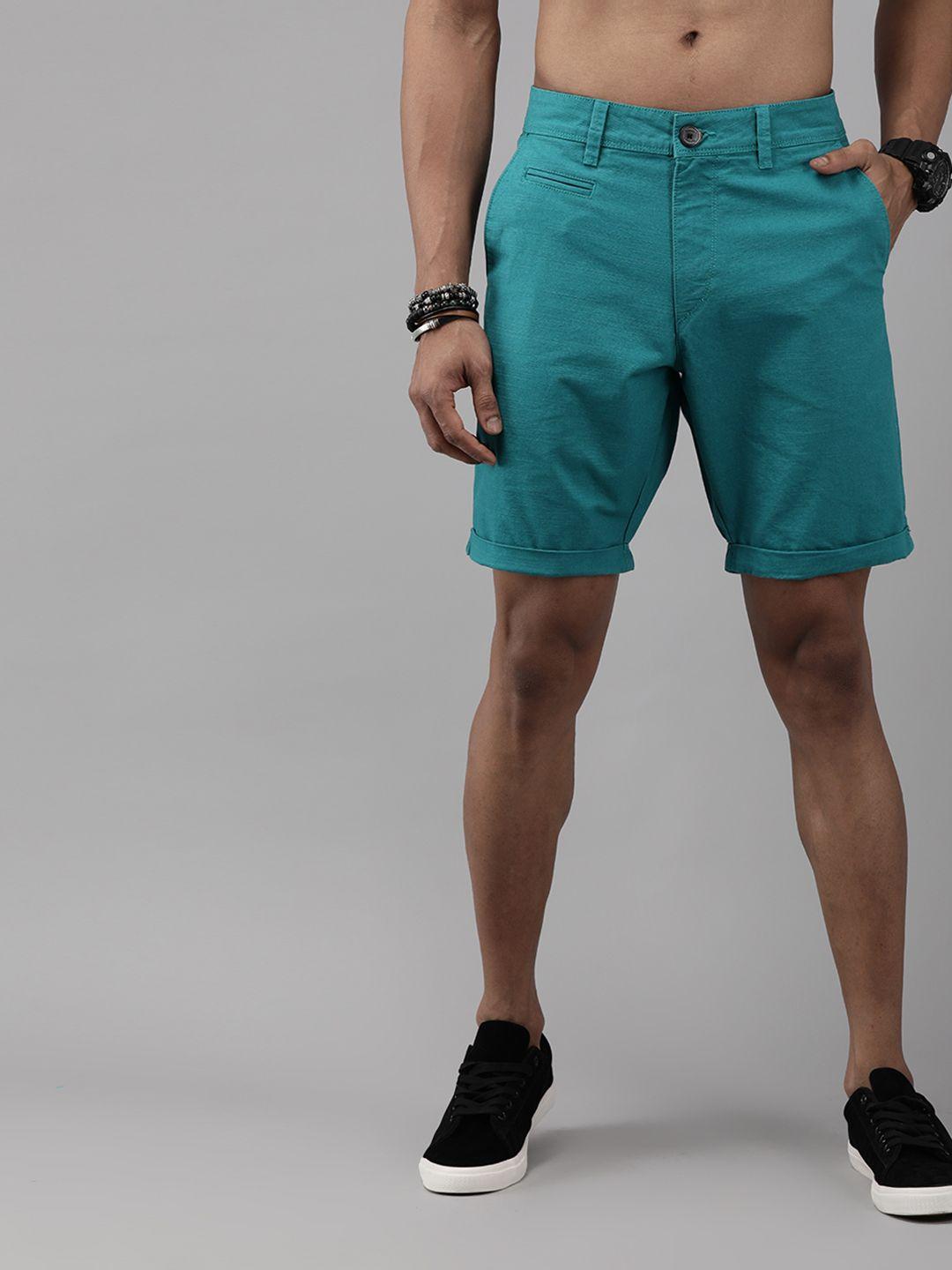 roadster men teal blue solid regular fit regular shorts