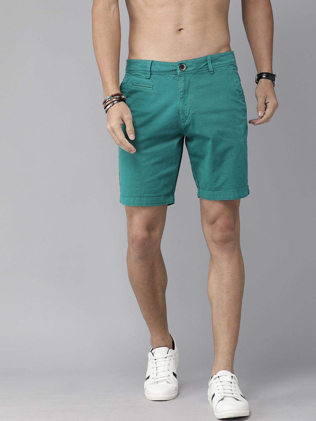 roadster men turquoise blue solid regular fit shorts