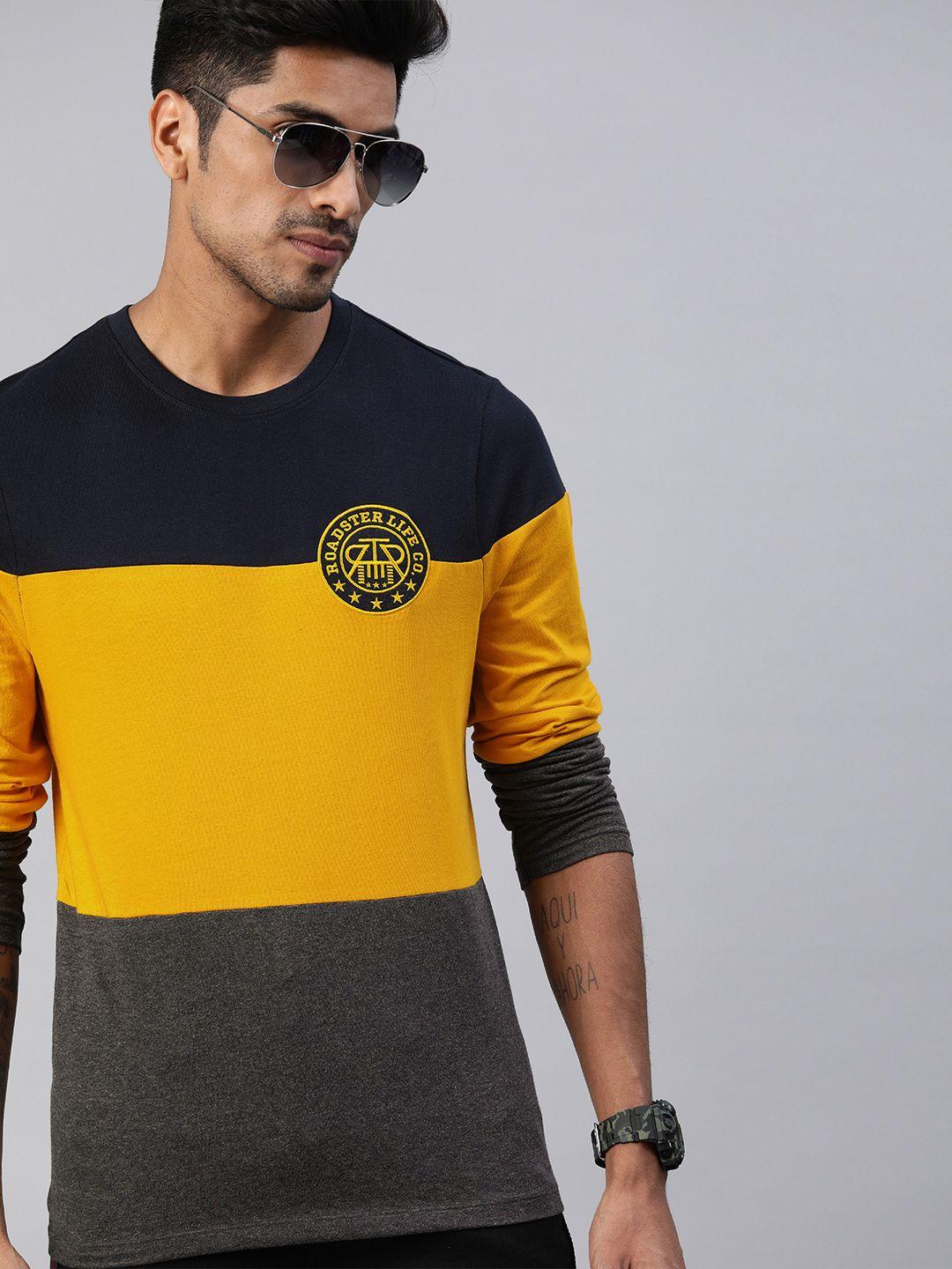 roadster men yellow & navy blue colourblocked round neck t-shirt
