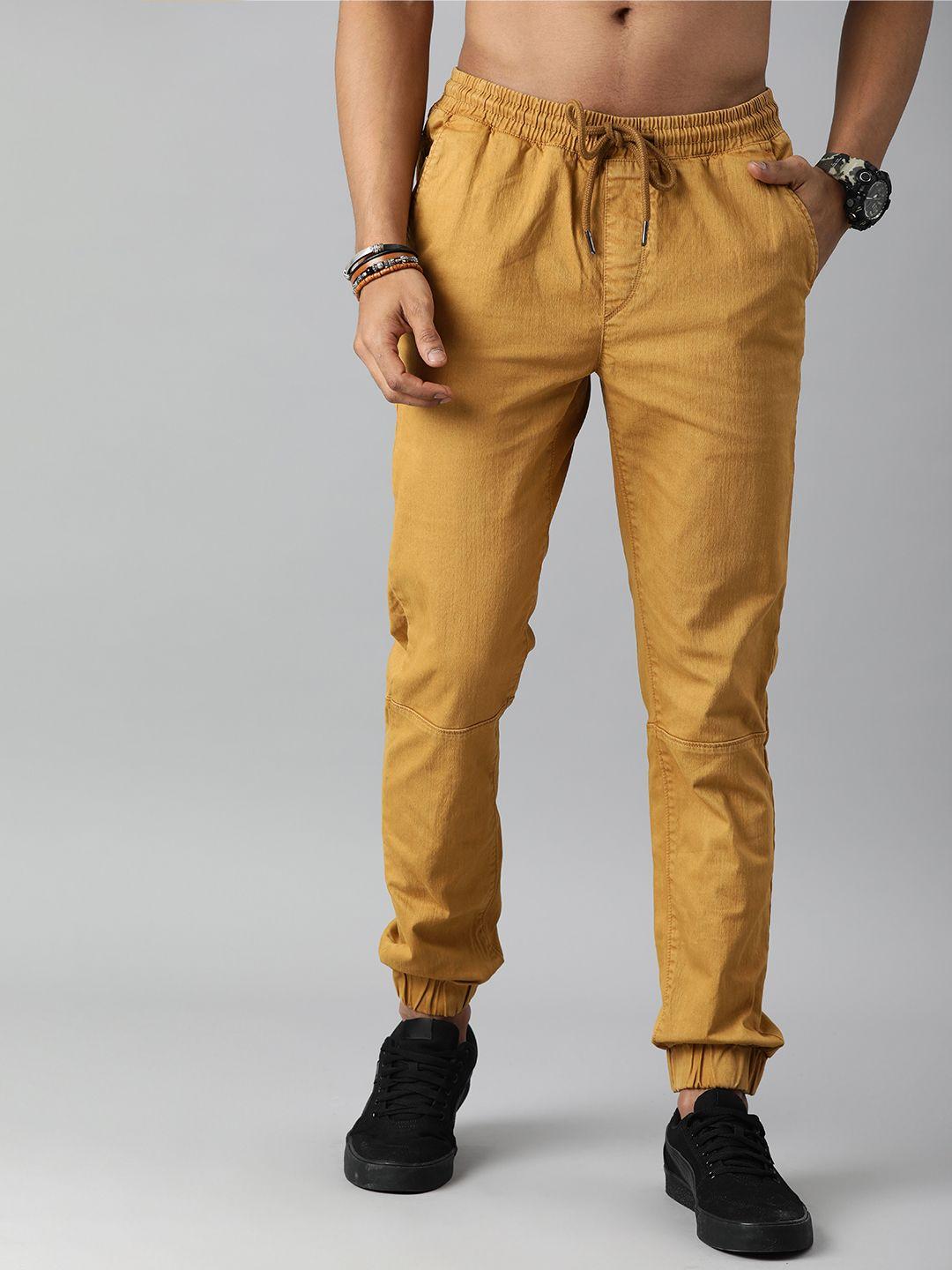 roadster men yellow solid joggers