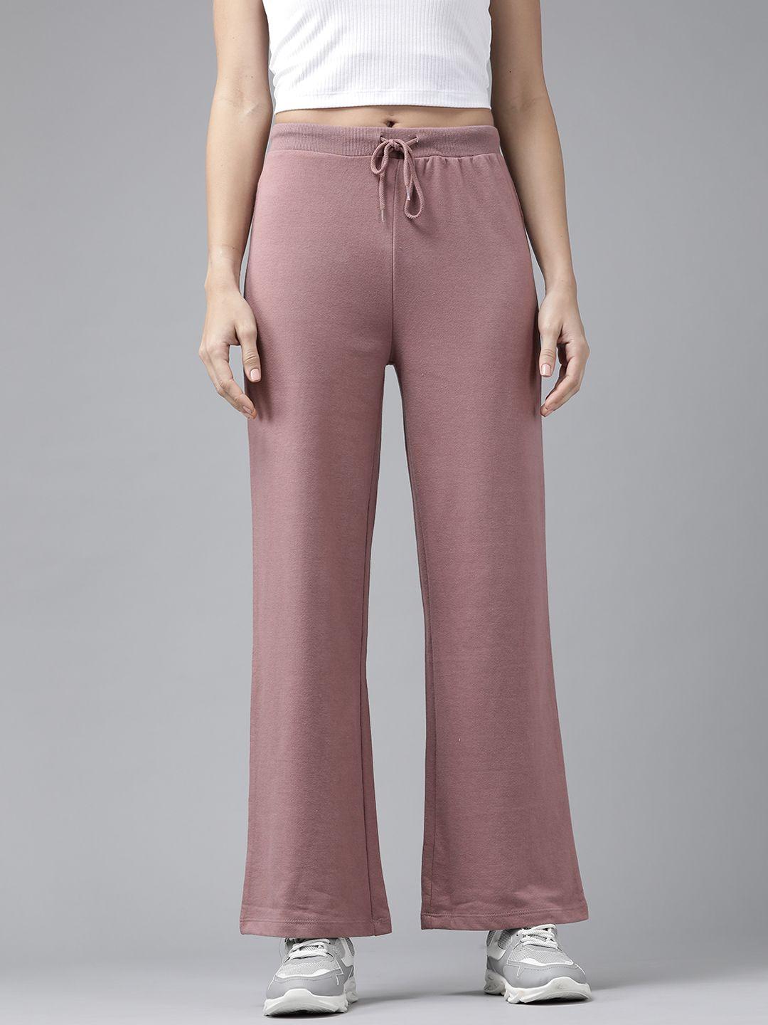 roadster women mauve solid straight fit track pants