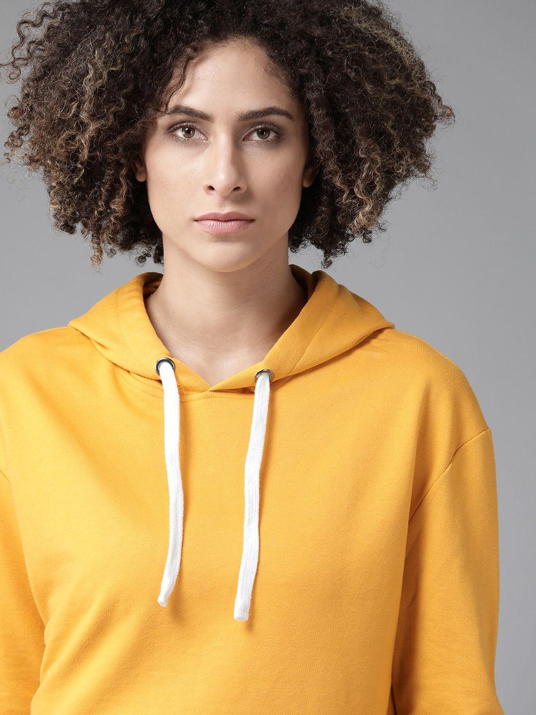 roadster women mustard solid boxy hooded sweatshirt