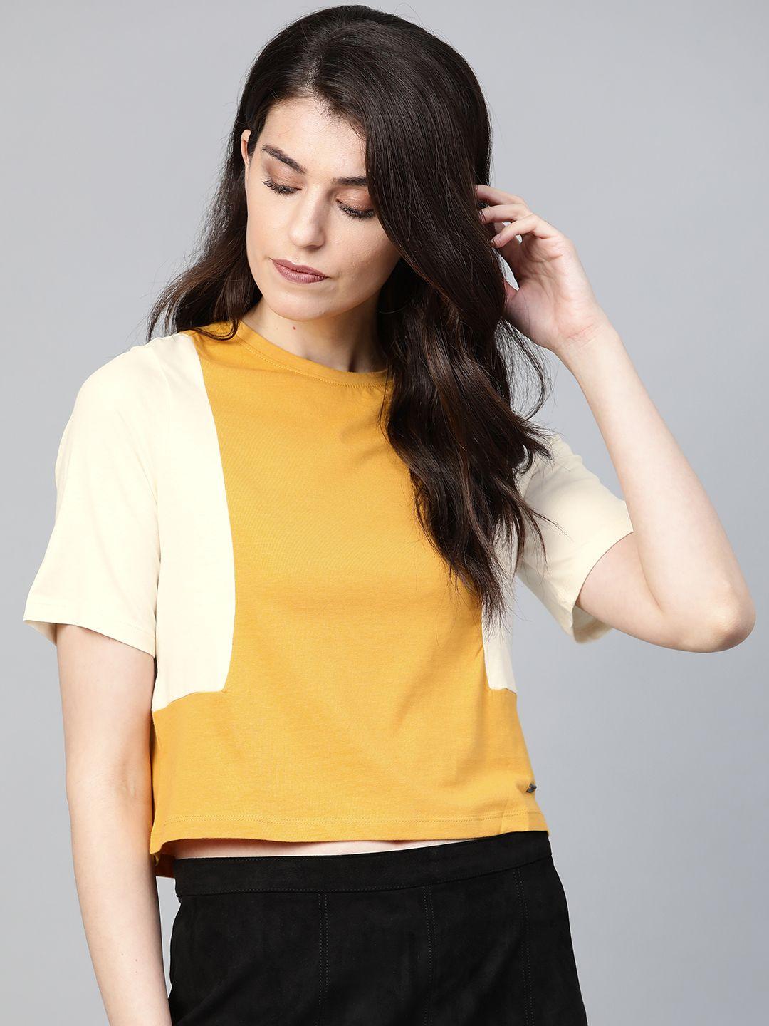 roadster women mustard yellow & off-white colourblocked round neck t-shirt