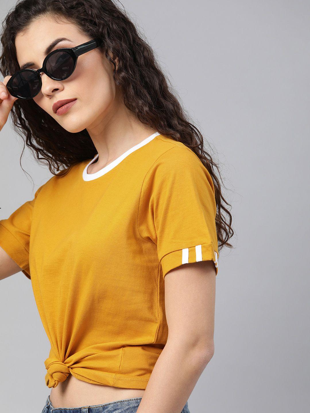 roadster women mustard yellow solid round neck pure cotton t-shirt with sleeve stripes