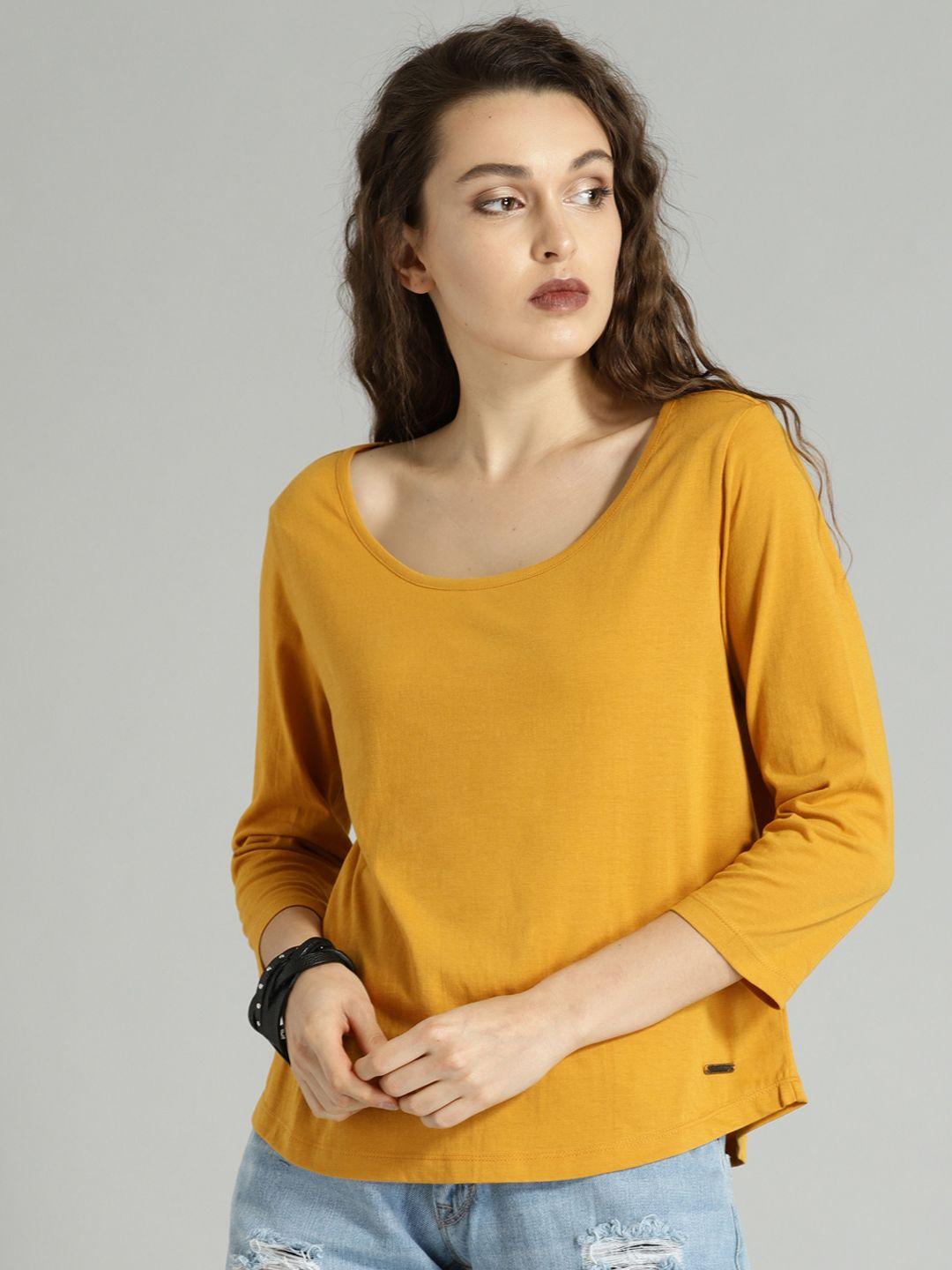 roadster women mustard yellow solid round neck t-shirt