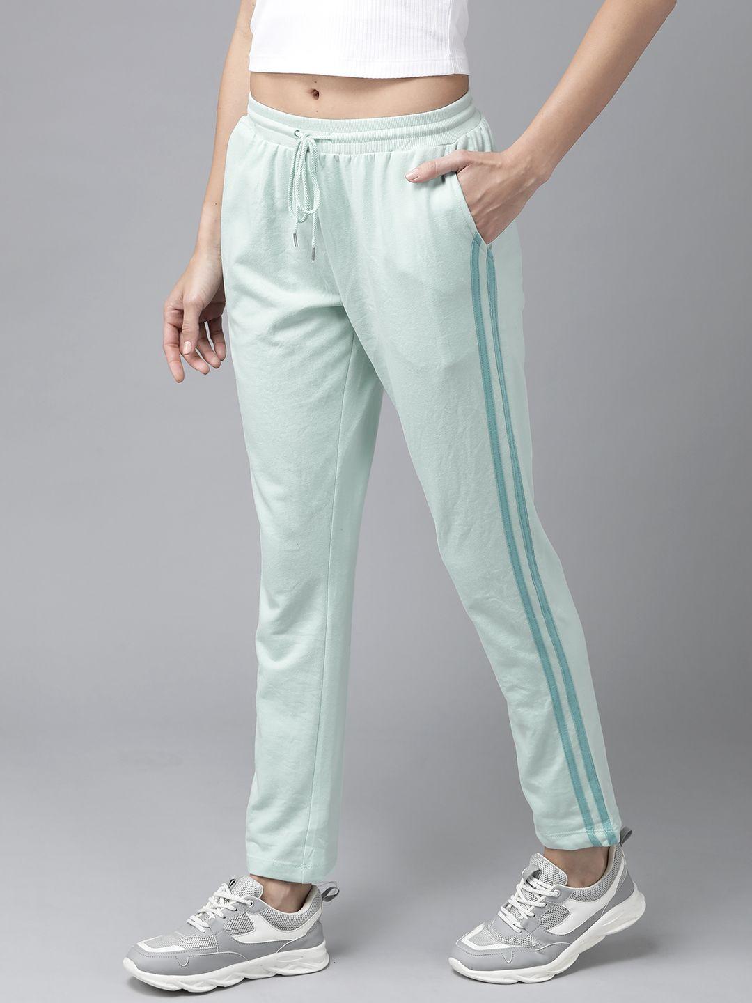 roadster women sea green solid cropped track pants with side stripes